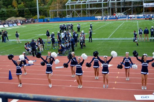 University of New Hampshire cheerleaders perform at the 2015 homecoming game against Elon University. Photo/Meg Heckman 